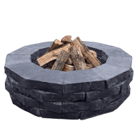 Костровая чаша из камня Belgian Black на загородном участке